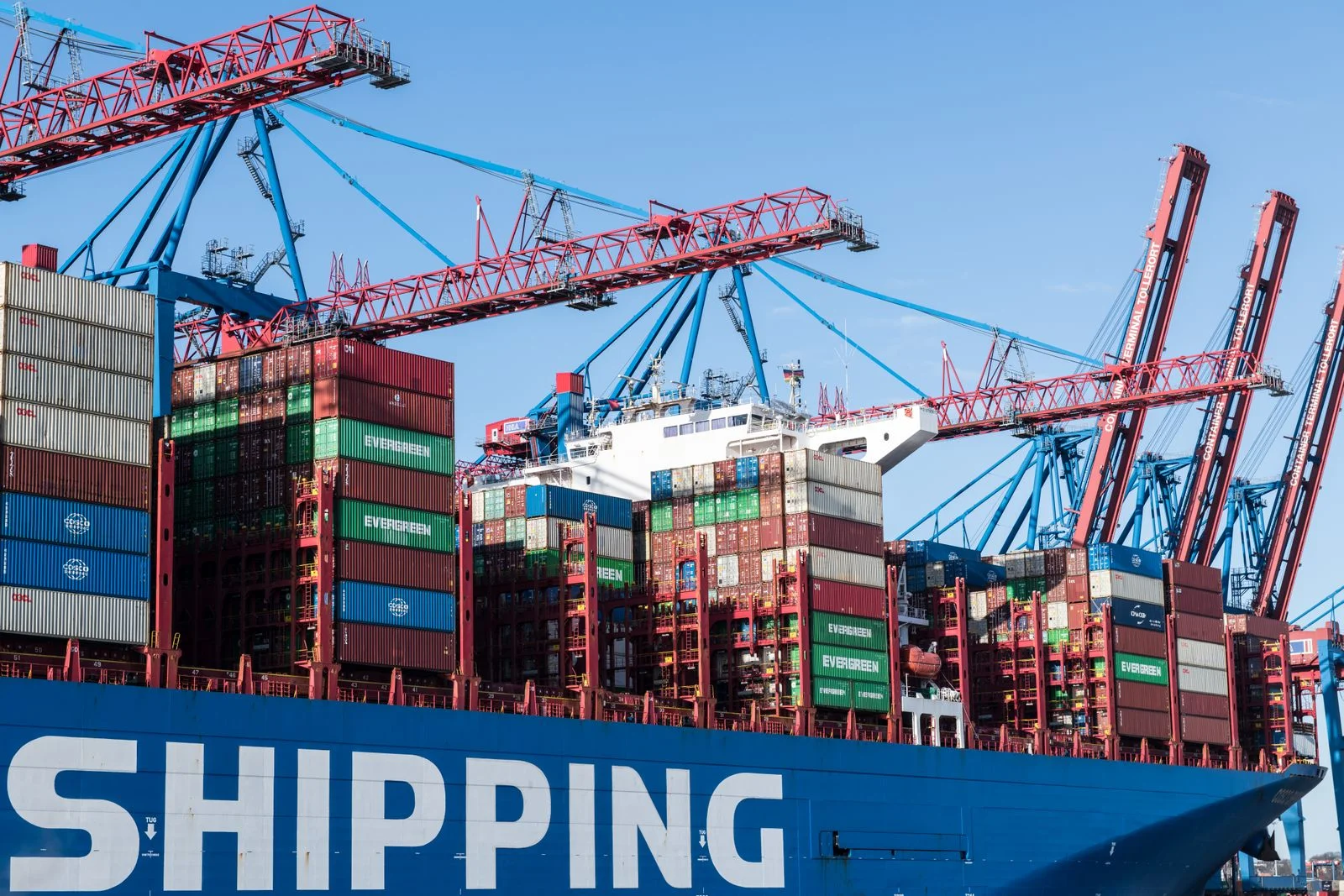 Shipping containers and cranes at a port